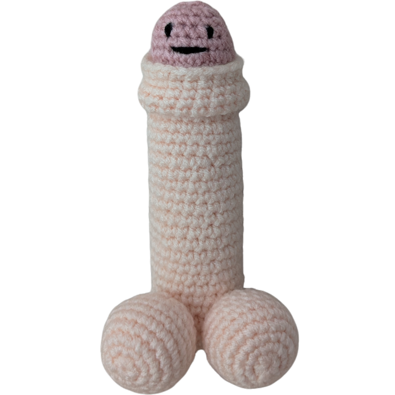 Hand crocheted penis with foreskin, face, and balls in the color peach with a pink head and foreskin